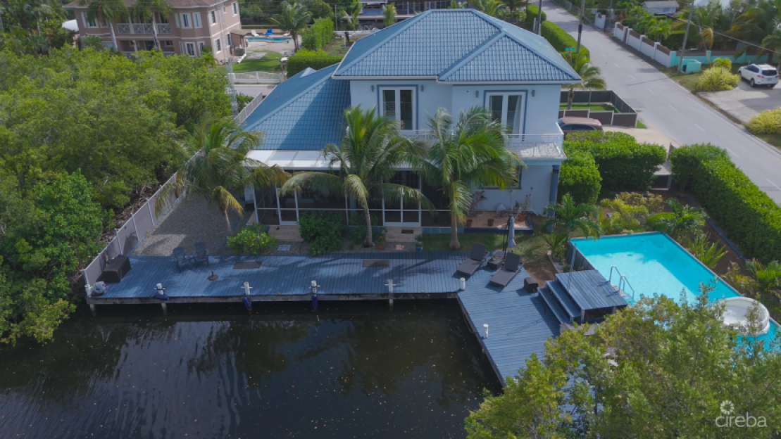 Sun Rose Canal Front Home - North Sound Estates - 1